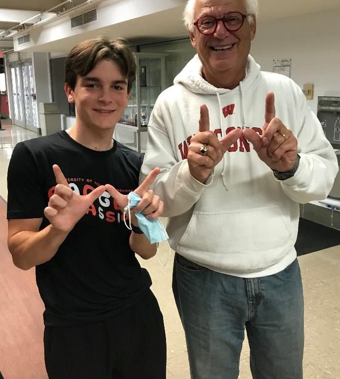 “On Sunday, November 7, I attended the Badger Invite, a USTA Tennis on Campus event, held at the University of Wisconsin-Madison. Attending schools came from a great many locations, but Penn State and Colorado State traveled the furthest. Pictured with me is USTA Midwest Collegiate Board member, Logan Homburg, who with Club President Reid Brushoff, Badger Classic Co-ordinators, Amy Puz and Kevin Fan, did a fabulous job directing the event and leading the Wisconsin TOC chapter with great enthusiasm and dedication. On Wisconsin!”